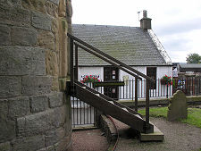 Steps Leading to Tower Door, With Culdees Tearoom in Background