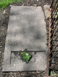 Grave Slab Overlapped by Enclosure