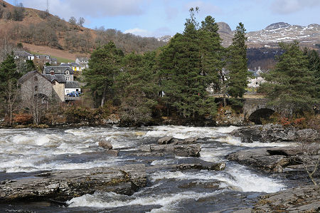 Falls of Dochart with the River In Spate: compare with the much lower water levels shown in the footer image