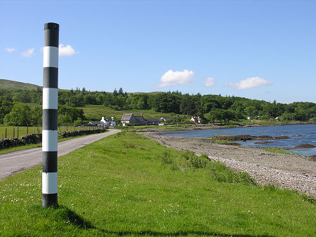 Pennyghael Seen Along the Shore of Loch Scridain from the North-East, with a Passing Place Marker in the Foreground