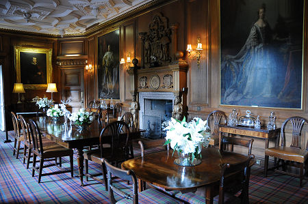 Paintings of King George III and Queen Charlotte by Allan Ramsay in the Dining Room of Ballindalloch Castle