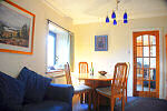 The lounge/dining room at 3 Broom Cottages