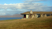A lounge in of of Blue Reef Cottages