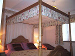 Four poster bedroom