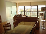 A view of the lounge/dining room at Lancefield Quay