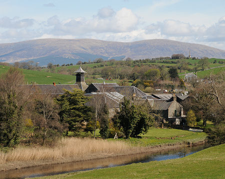 Bladnoch Distillery with the River Bladnoch in the Foreground and the Galloway Hills in the Distance