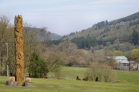 The Totem Pole with the Forest of Ae in the Background