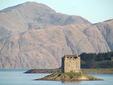 Castle Stalker with the Mountains of Morvern Beyond