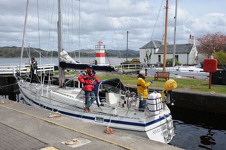 Yacht Preparing to be Lowered in the Loch