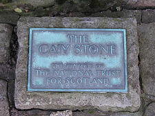 Sign at Foot of Stone