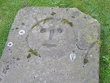 Smiley Face on Gravestone