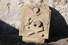 Gravestone with Symbols of Mortality