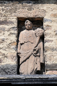Roman Statue Behind Wheatsheaf