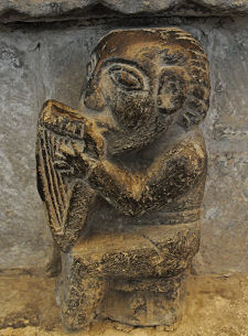 Carving of a Harpist