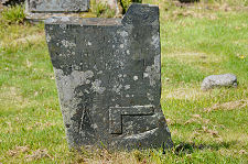 Gravestone with Dividers and Set Square