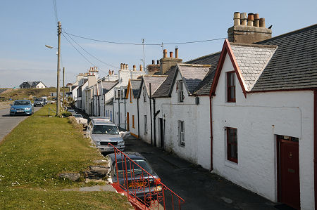 Cottages in Port Logan, with the new causewayed road on the left