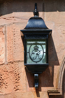 One of the Lamps Flanking the Front  Door