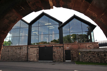 Lindores Abbey Distillery Seen Through the Entrance Archway of the Abbey Ruins