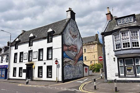 The (Closed) Loudoun Arms and Hand Darner Sitting on a Stool Mural