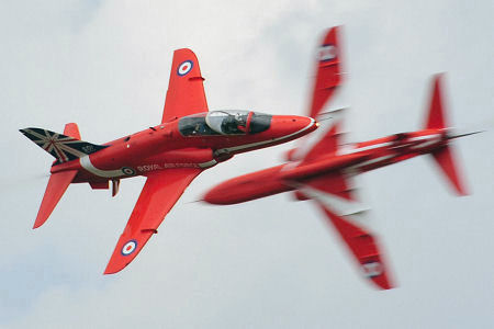 The Synchro Pair of the Red Arrows Perform a Pass at the 2014 Airshow