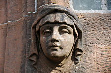 Carved Head Beside the Doorway