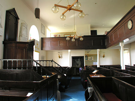 Interior of the Church, Complete with Clock Opposite the Pulpit
