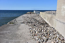 Shingle Coming Over Pier