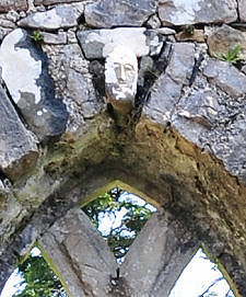 Reused Carved Face Over Window