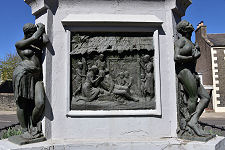 Plaque on base of Statue