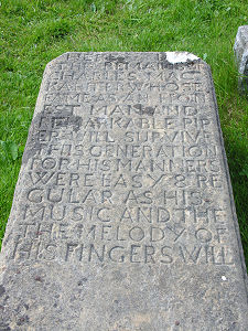 Incomplete Inscription on the Grave of Charles MacArthur