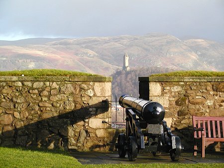 Gun of the Grand Battery with Wallace Monument and Ochils in the Distance