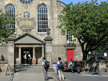 Statue of Robert Fergusson (Bottom Right of Image) Outside Edinburgh's Canongate Kirk