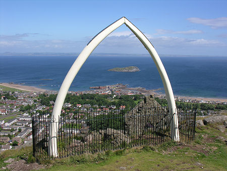 The top of North Berwick Law with North Berwick in the background