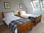 View of the twin bedroom at Burn Beag
