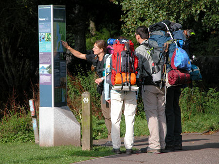 Visitors Consulting a National Park Information Point