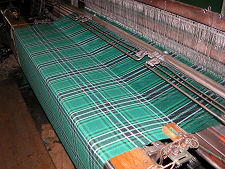 A later stage in the weaving