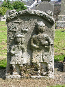 Upright Stone with Figure Carvings