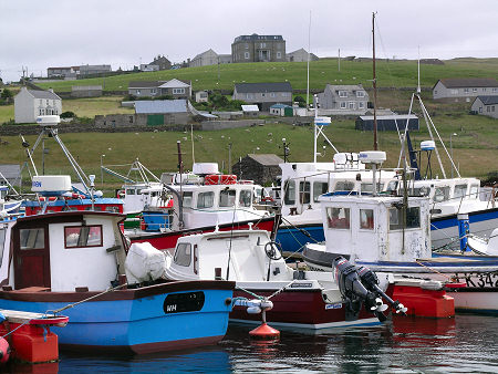 Symbister Harbour, with Symbister House on the Hill in the Background